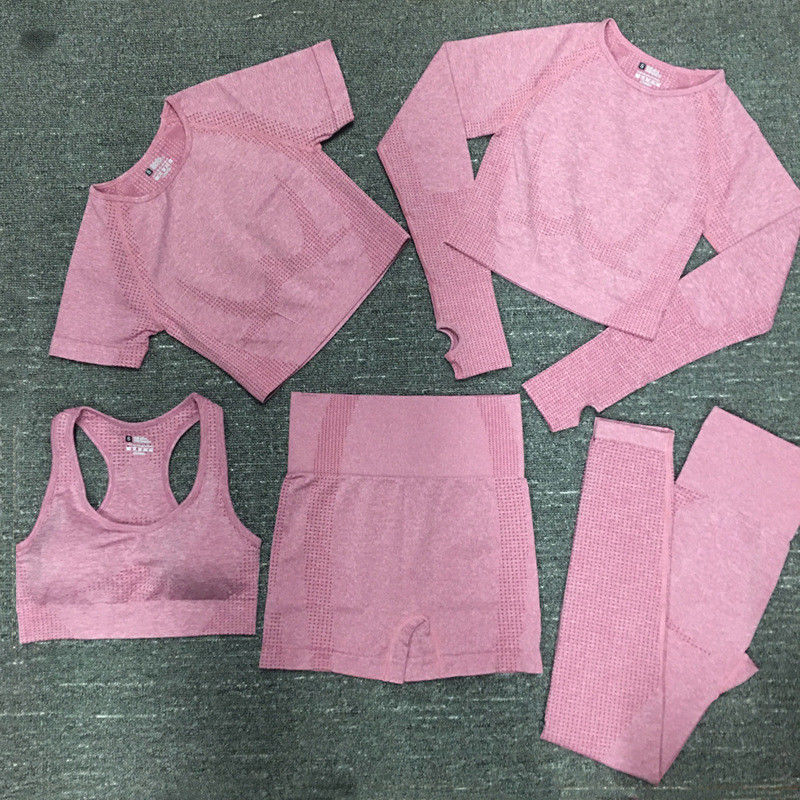 El poliéster de nylon Spandex cosechó la ropa de deportes proveída de costillas desgaste largo del gimnasio del top del entrenamiento de la manga